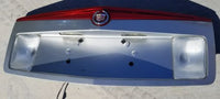 Placa de matrícula del panel del maletero Cadillac CTS usada PLATA 2003-2007 