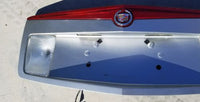 Placa de matrícula del panel del maletero Cadillac CTS usada PLATA 2003-2007 